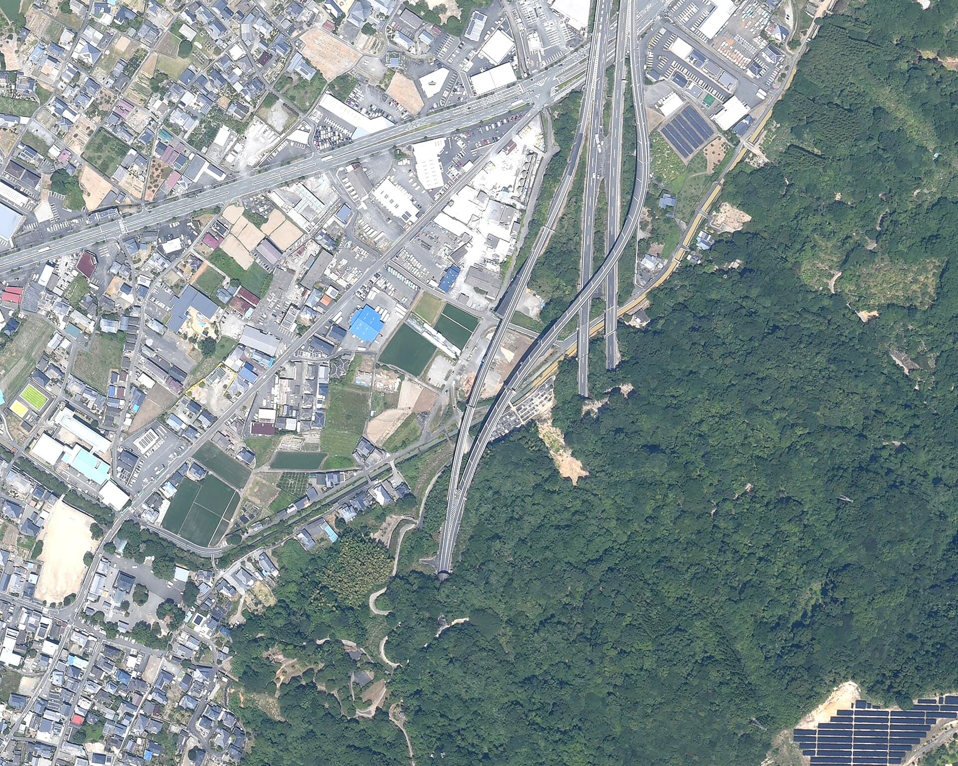 Aerial view of cracked Minami-Kyushu Expressway lanes near Yatsushiro Junction