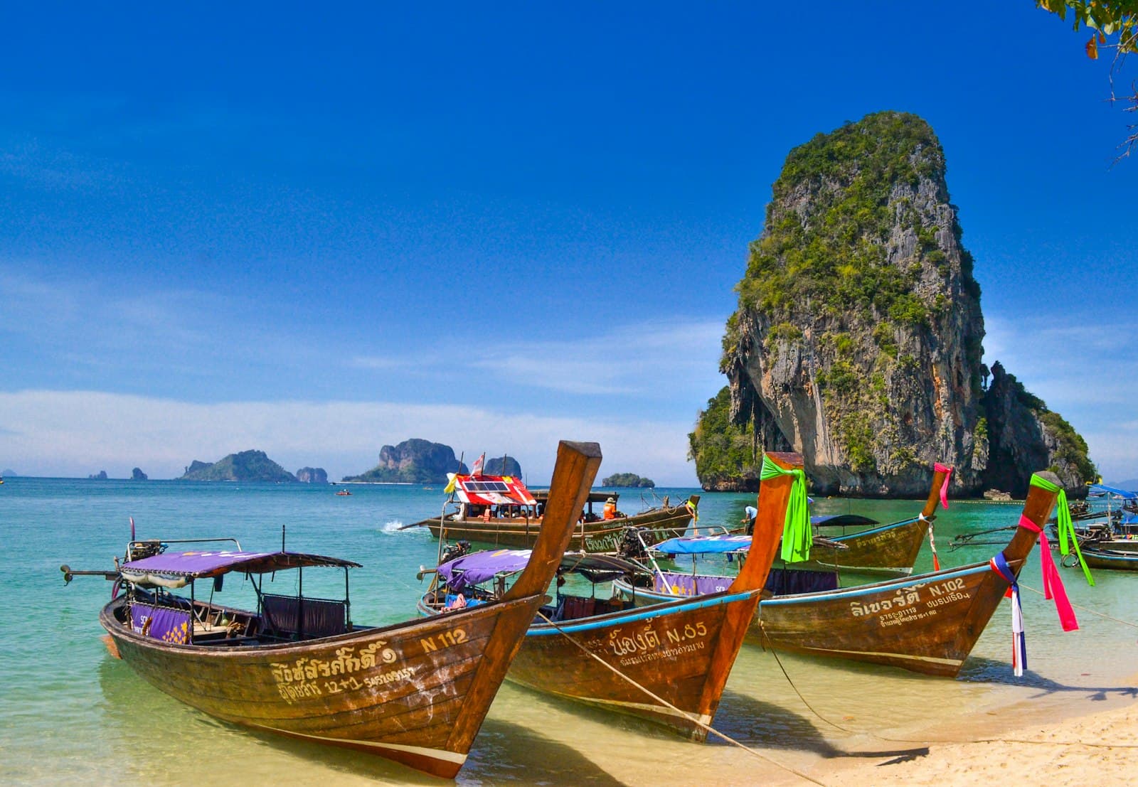 Tropical beach with long-tail boats