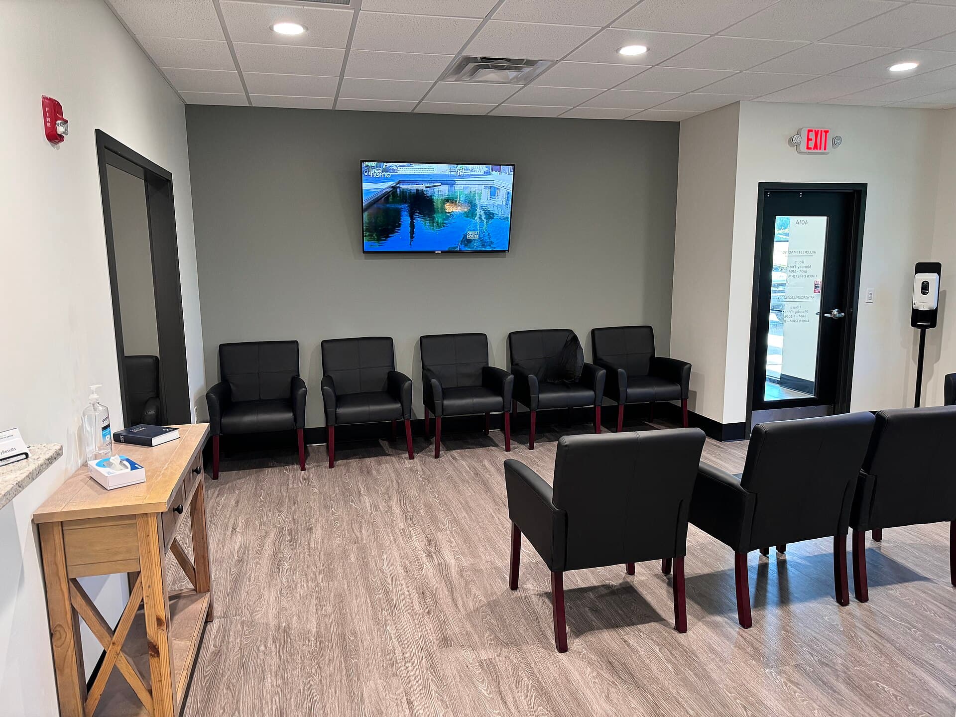 Bright hospital waiting room with empty chairs